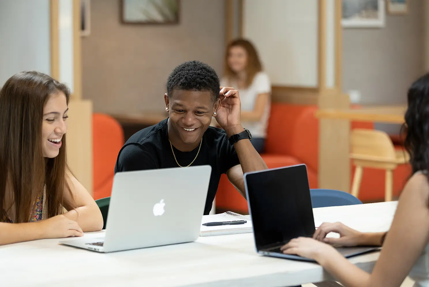 friends studying on computers