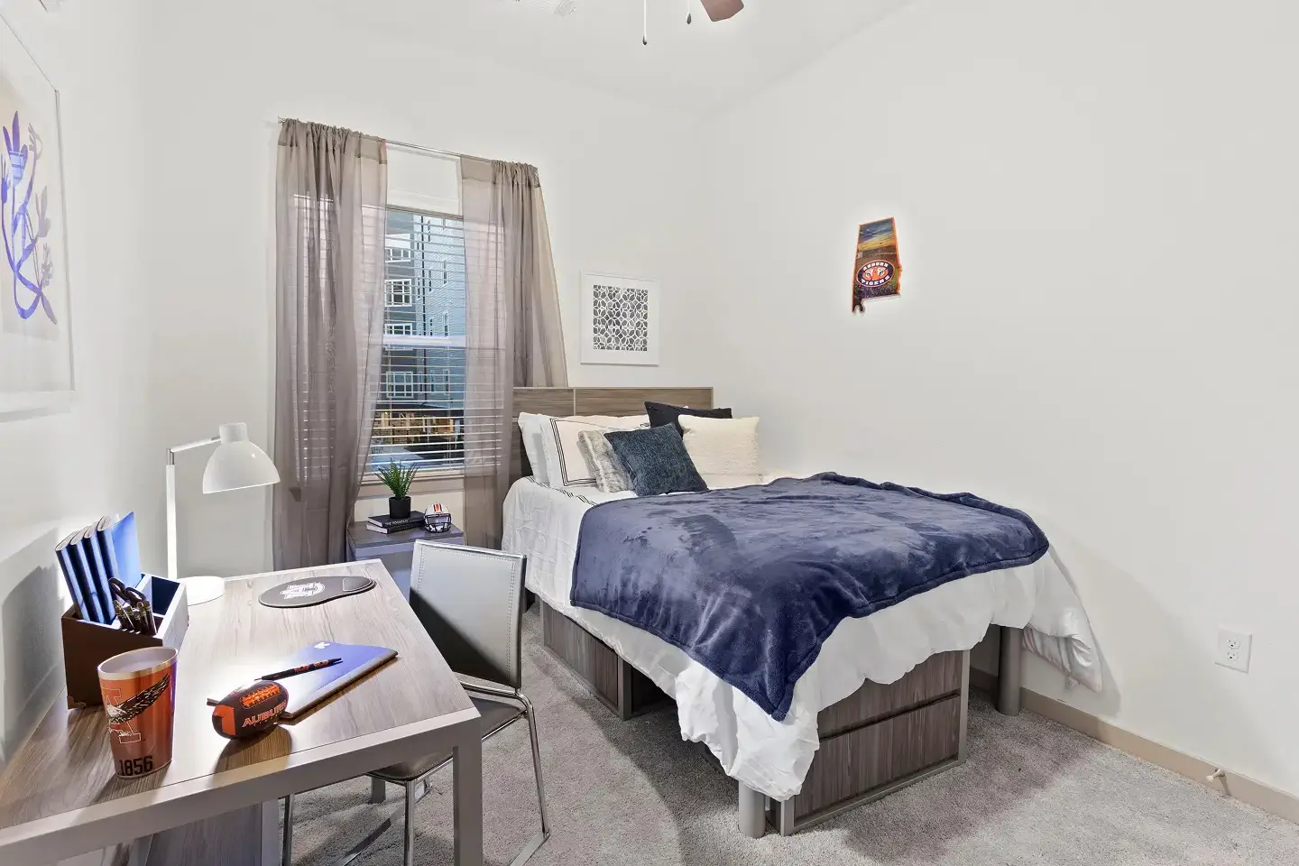 furnished apartment bedroom with a study desk